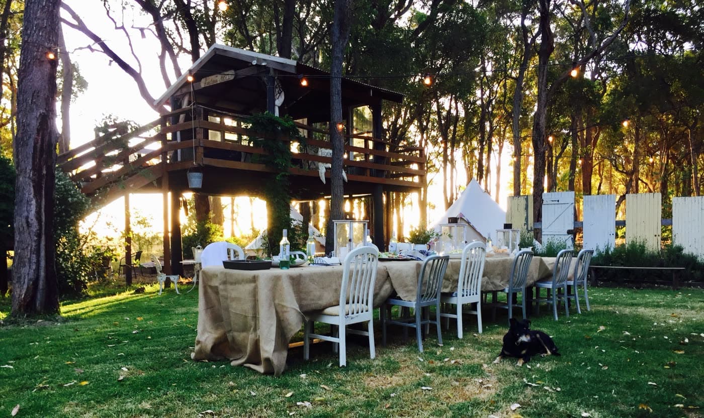 A long-table dinner by the treehouse at golden hour, Jesters Flat